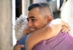 Man hugging his grandmother