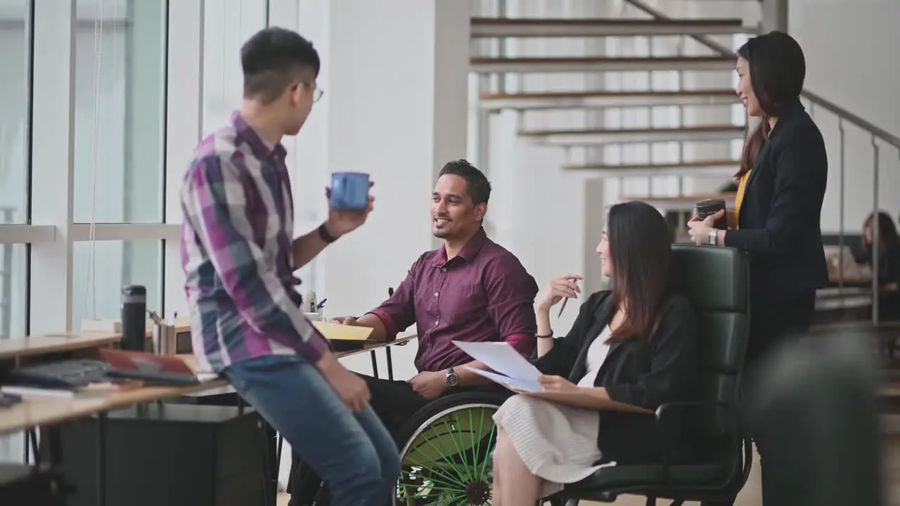 Group of office workers talking